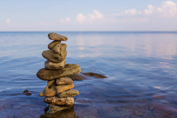 istock Stones pyramid on the beach 1415429136