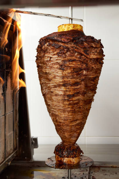 istock delicious trompo al pastor shepherds style Mexican taco. 1415431377