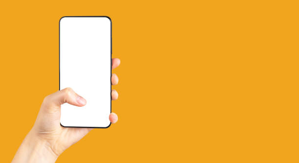 istock Banner with thumb tapping on phone mockup on orange background. Smartphone template with empty screen. Woman hand holding android. Copy space 1415431823
