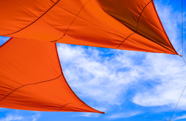 modern awning in front of sky - photo
