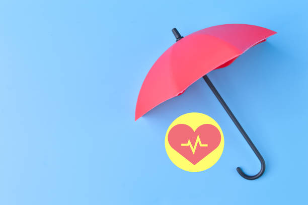 istock Red toy umbrella and heart shape symbol. 1415434792