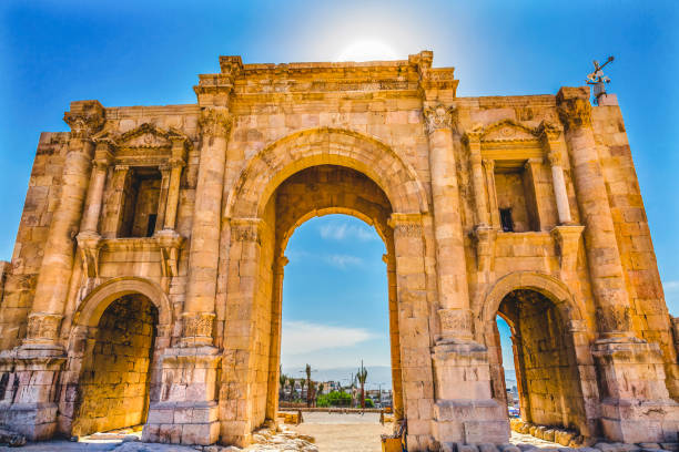 Hadrian's Arch Gate Sun Ancient Roman City Jerash Jordan stock photo