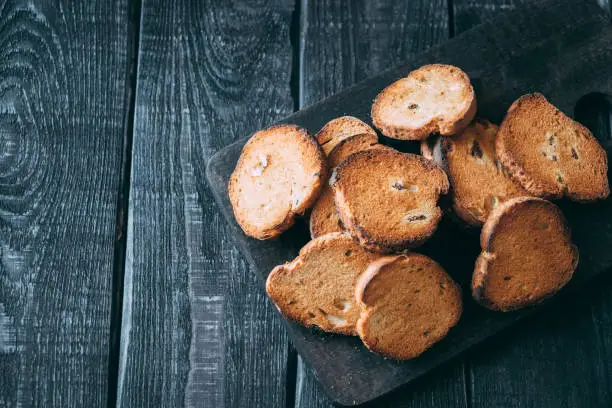 Dry sweet bread with raisins. Bread toast, dessert for tea and coffee. View from above.