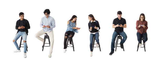 istock Latin young people sitting in a row and using phones 1415442774