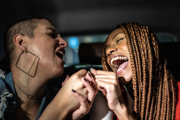 istock Friends singing in the car 1415444424