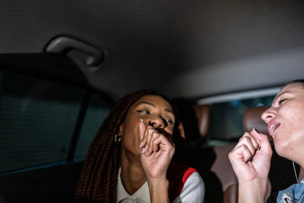 istock Friends singing in the car 1415444445
