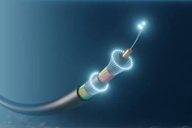 Submarine underwater communication fibre optic cable on deep sea bed
