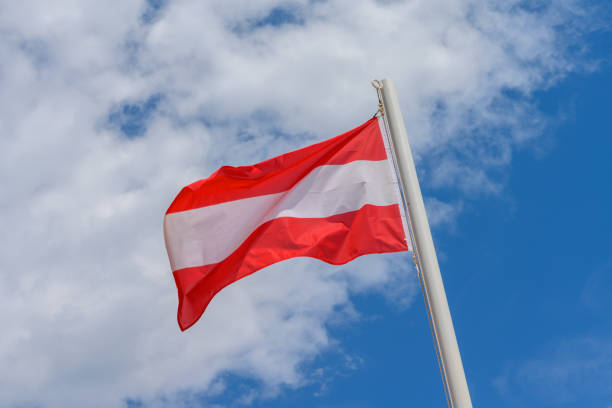 istock Austrian flag waving in the wind 1415449745