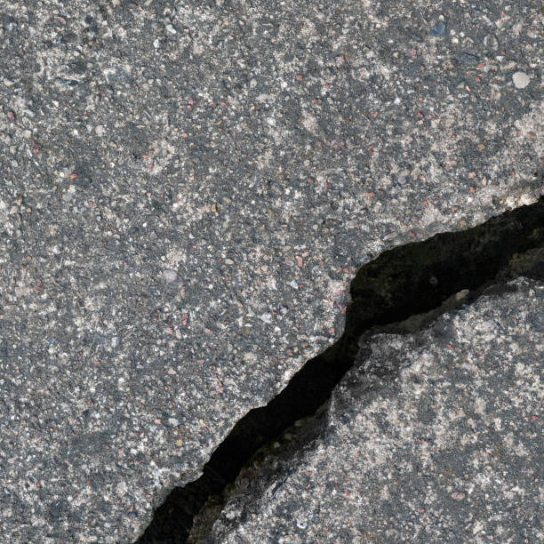 istock Old aged weathered cracked grey black tarmac texture pattern, large detailed damaged textured asphalt grungy background flat lay, horizontal rough grained broken pattern macro closeup grunge copy space 1415449761