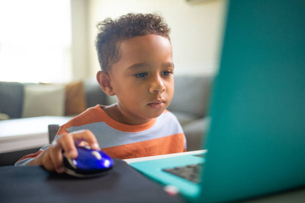 Kid Using Labtop With Mouse 4,200+ Computer Mouse For Children Stock Photos, Pictures & Royalty ...