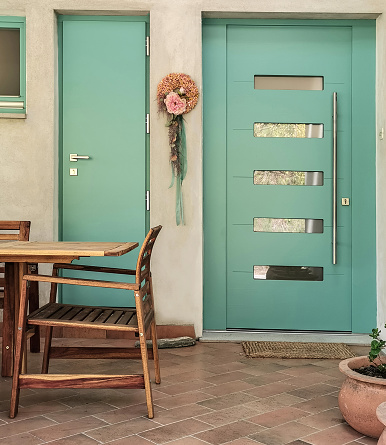 New Modern Turquoise Front Door with Spring Garland