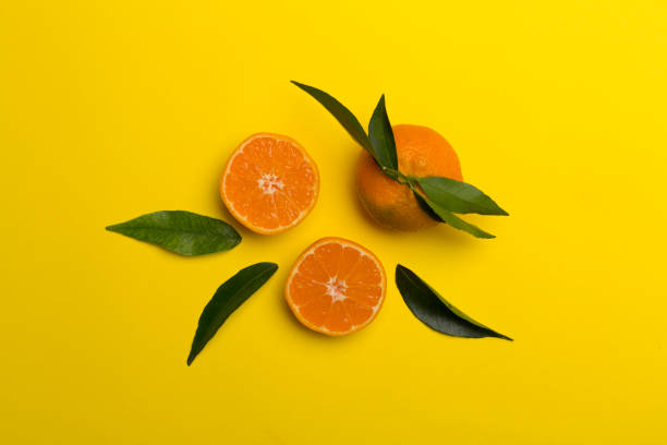 istock Flat lay with fresh mandarines on color background 1415456859