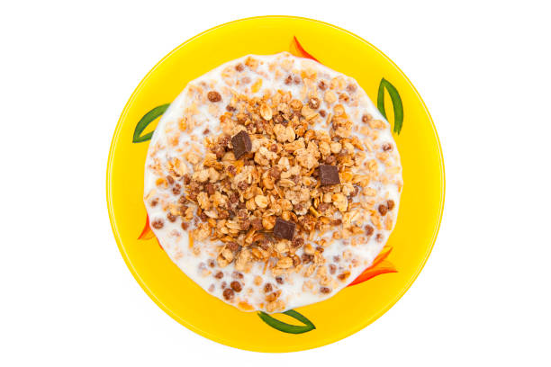 istock Top view of muesli isolated on white background 1415456909