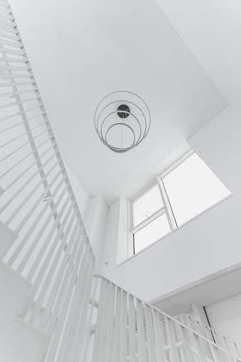Zoom in image of a modern electric ceiling lamp in an entrance hall