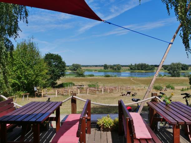 istock Benches and tables under awnings in the Elbe floodplains 1415462430