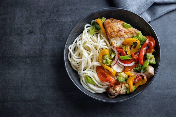 istock Noodles with vegetables in bowl 1415464580