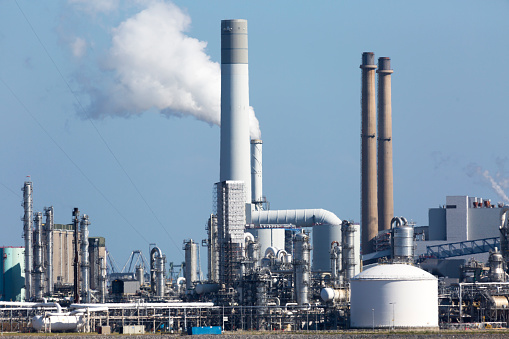 Petrochemical plant in Netherlands, air pollution, pollution of the environment, continuous emission of environmental degradation factors, global warming, Netherlands, Benelux, Europe.