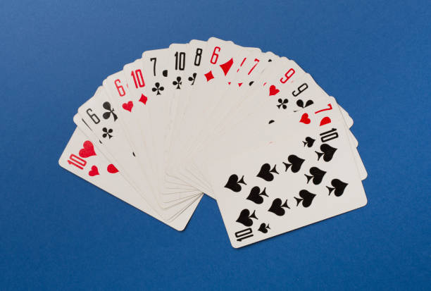 istock Playing cards on color background. Gambling concept. Top view 1415467957