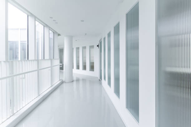 istock Glass floor to ceiling windows on both sides of the corridor 1415469157