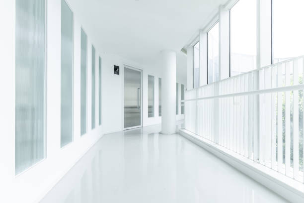 istock Glass floor to ceiling windows on both sides of the corridor 1415469188