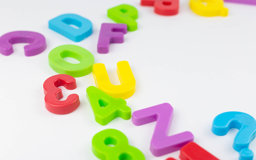 Colorful letters on a white background. Game. Education. Preschool.