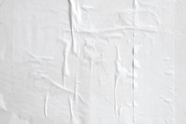 istock white crumpled and creased paper poster texture background 1415483166