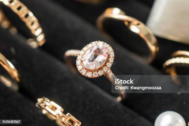 Gold Jewelry Diamond Rings Show In Luxury Retail Store Display Showcase Stock Photo - Download Image Now