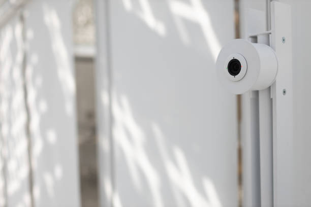 face recognition system with camera in front of the office in white stock photo