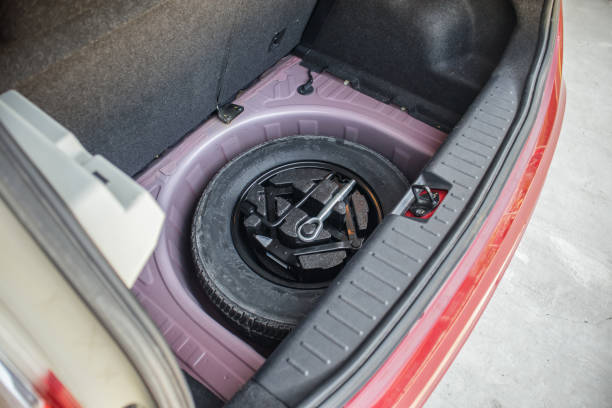 istock spare tire in the modern compact car 1415484181