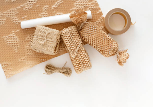 istock Environmental friendly paper bubble pack. Products packed with paper cushioning and paper packaging tape. 1415487395