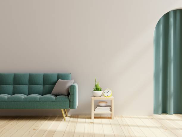 istock Living room with green sofa on empty white wall background. 1415491394