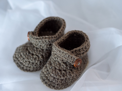 Close up knit baby booties