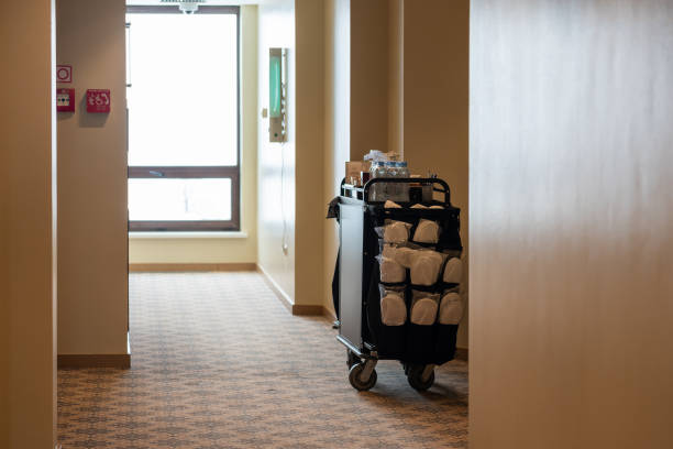 istock A cleaning trolley used by maids in a deserted hotel corridor 1415500752