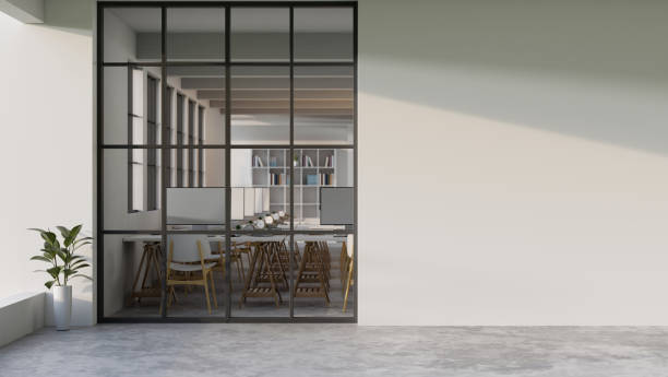 istock Modern office corridor or hall interior design with a large window and empty space over the white wall 1415506842