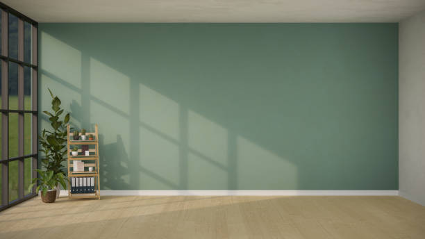 istock Modern trendy empty room with copy space on wood floor over the green wall. 1415506853