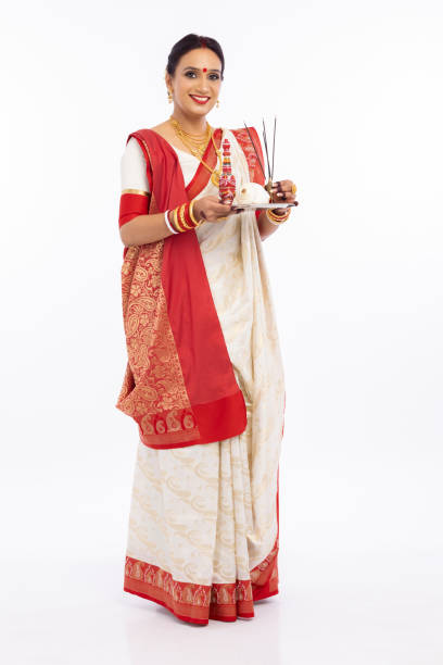 istock Bengali woman with puja thali. 1415507459