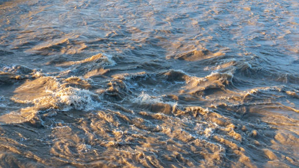 istock The heavy downpour caused high level flood in the river 1415508812