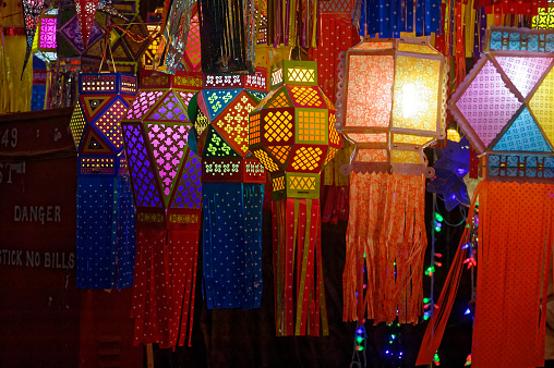 Colorful traditional Lanterns in Various Shapes Akash     kandil (Diwali decorative lamps) Hang out side shop for sale celebrating Diwali Festival in Mumbai state Maharashtra India