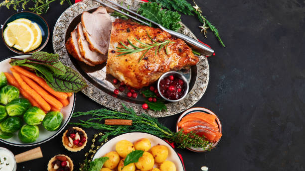 istock Traditional Christmas dinner on dark background. 1415516086