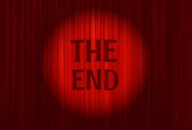 istock Red cinema curtains with light beam and unscription The end. Vector illustration 1415520635