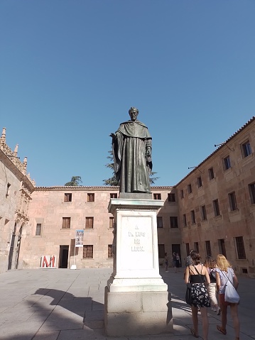 August 3, 2022. Salamanca, Spain. Large statue of fray Luis de Leon, a poet and professor, in the University in Salamanca