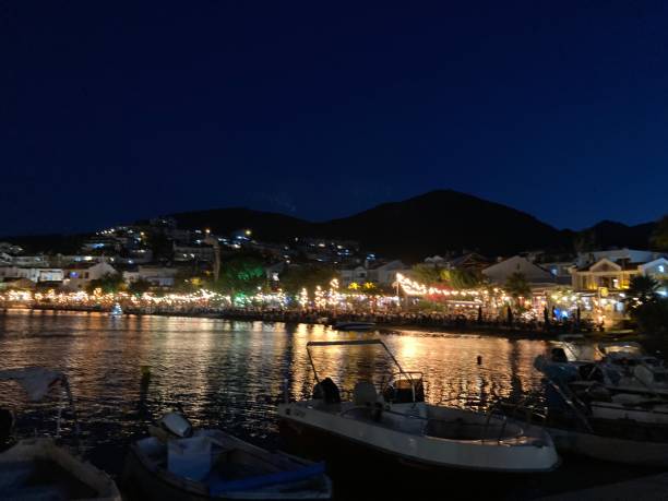 istock Night view from the sea shore town 1415522849