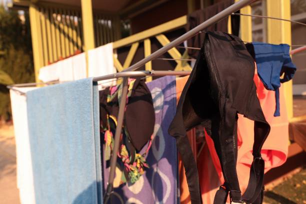 istock clothes drying in the sun on a camping clothesline 1415524998
