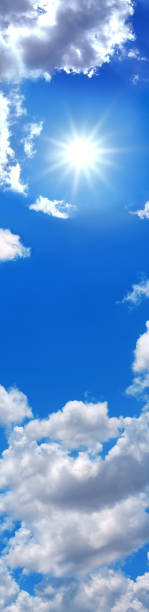 istock Sunny blue sky and white clouds with shinning sun, sky only background 1415527018