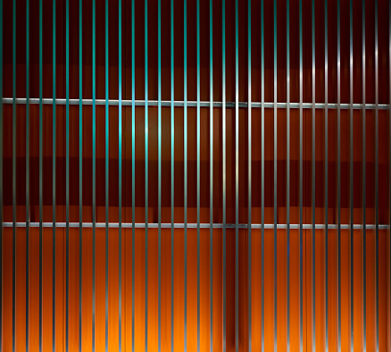 colored architectural lattice on the wall of the house