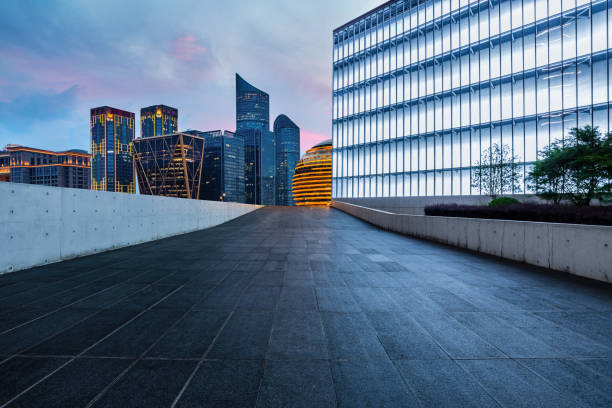istock Empty floor and city building at sunrise 1415532542
