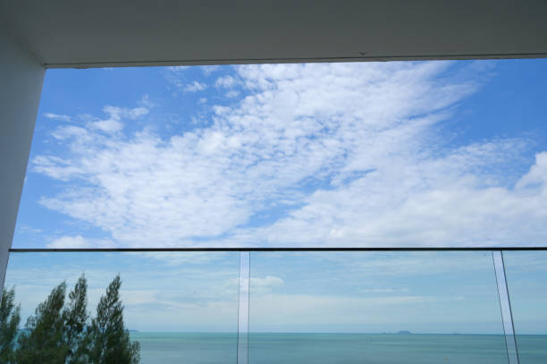 istock glass balcony with sea and sky background 1415533667