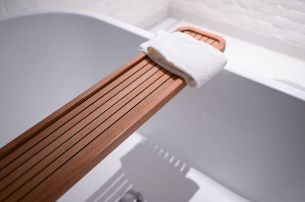 istock white towels put on bathtub in the bathroom 1415533695