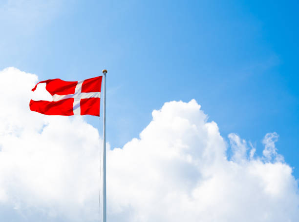 istock Danish National flag, Dannebrog on a flagpole. 1415535570