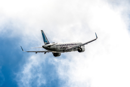 Ponta Delgada, Portugal - July 9, 2022: Azores Airlines Airbus A321-253NX - Peaceful taking off the airport. Airbus A321 with the Peaceful theme flying against sky